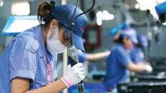 Dual challenge of balancing political tasks with 8-percent growth goal