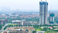 Rate hike puts real estate market under double pressure