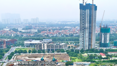 Rate hike puts real estate market under double pressure